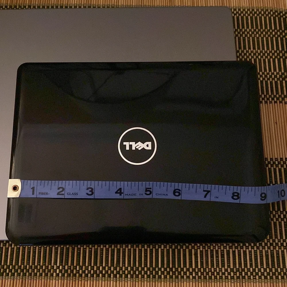 The Dell Inspiron 910, Model PP39S with soft carry case and power cord.